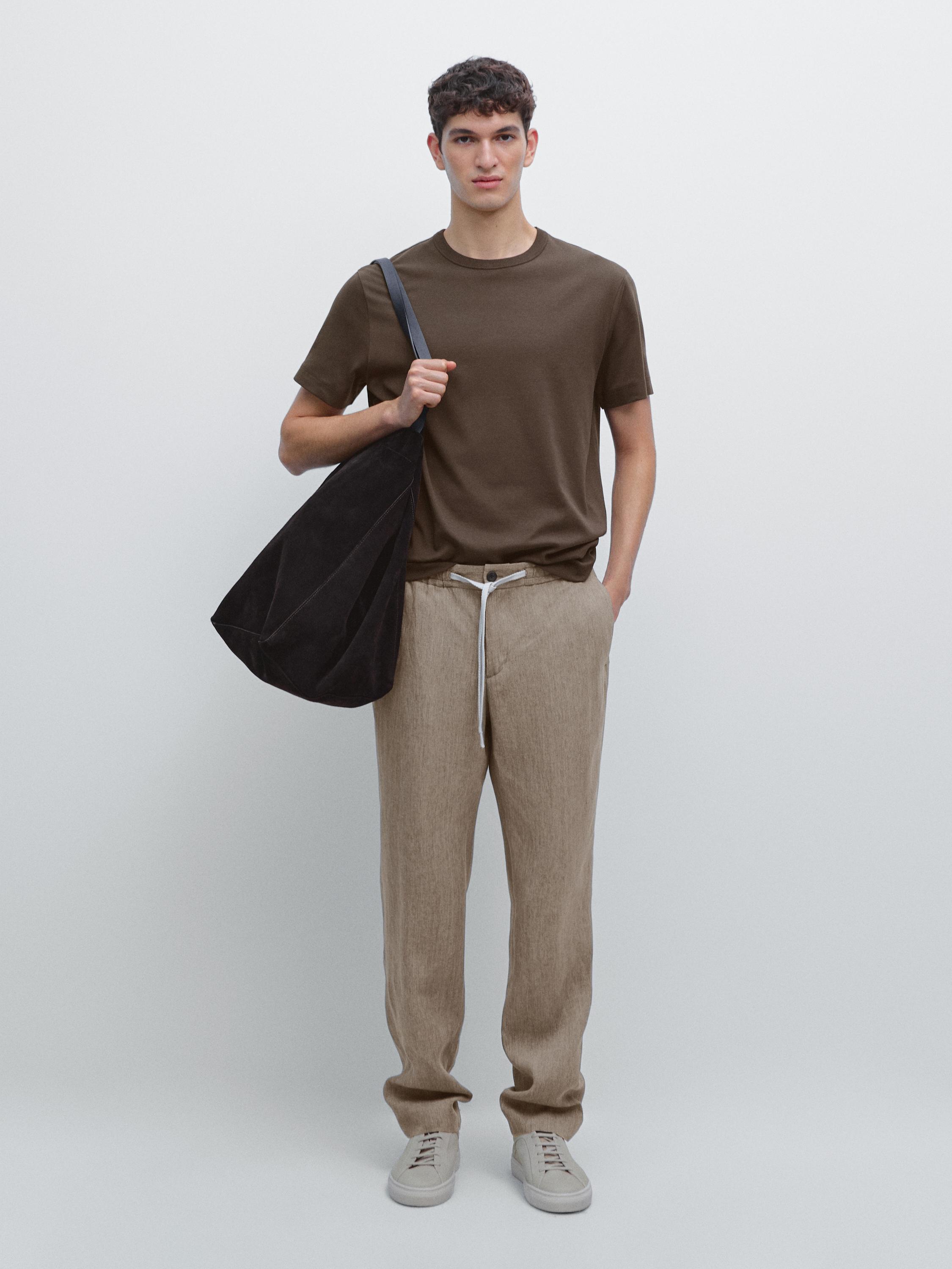 Faded total look linen trousers